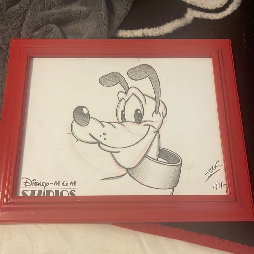 WWD Pluto framed Print